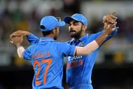 BRISBANE, AUSTRALIA - JANUARY 15:  Ajinkya Rahane (L) of India celebrates after taking the catch to dismiss Aaron Finch of Australia during game two of the Victoria Bitter One Day International Series between Australia and India at The Gabba on January 15, 2016 in Brisbane, Australia.  (Photo by Bradley Kanaris/Getty Images)